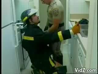 Fireman sucks policeman's Huge dong