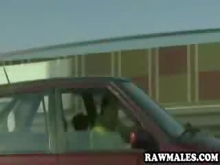 Muscular hunk getting his hard dick sucked in the car