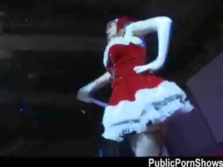 Delicious stripper in Santa costume getting naughty